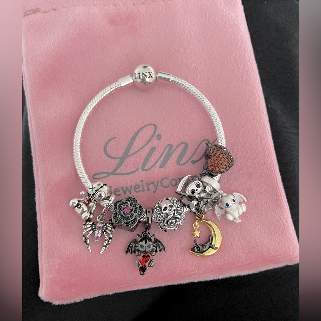 Linx Snake Chain Bracelet With Dark Themed Charms 269$